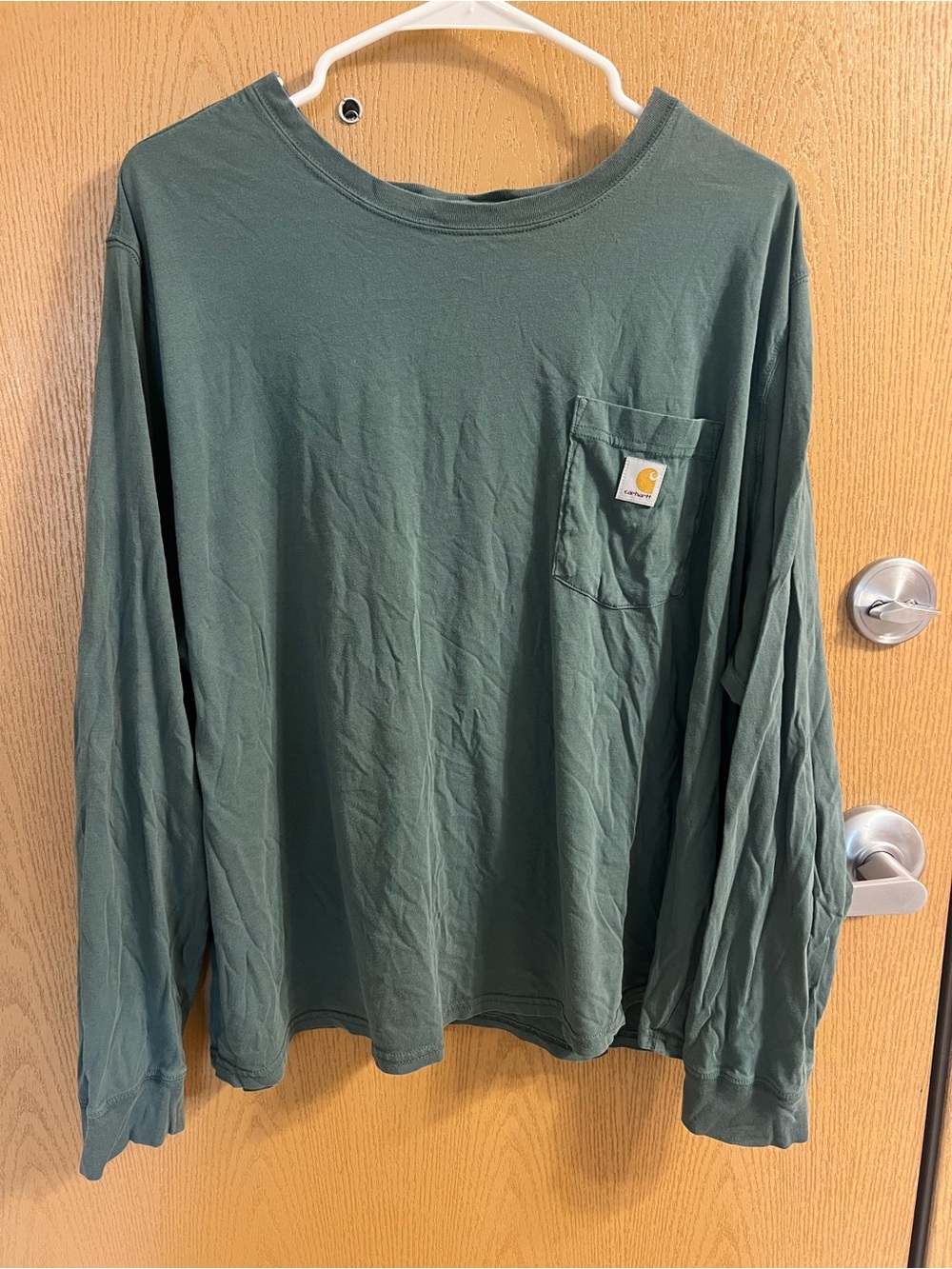Carhartt women’s Long-Sleeve Pocket Tee in Forest Green